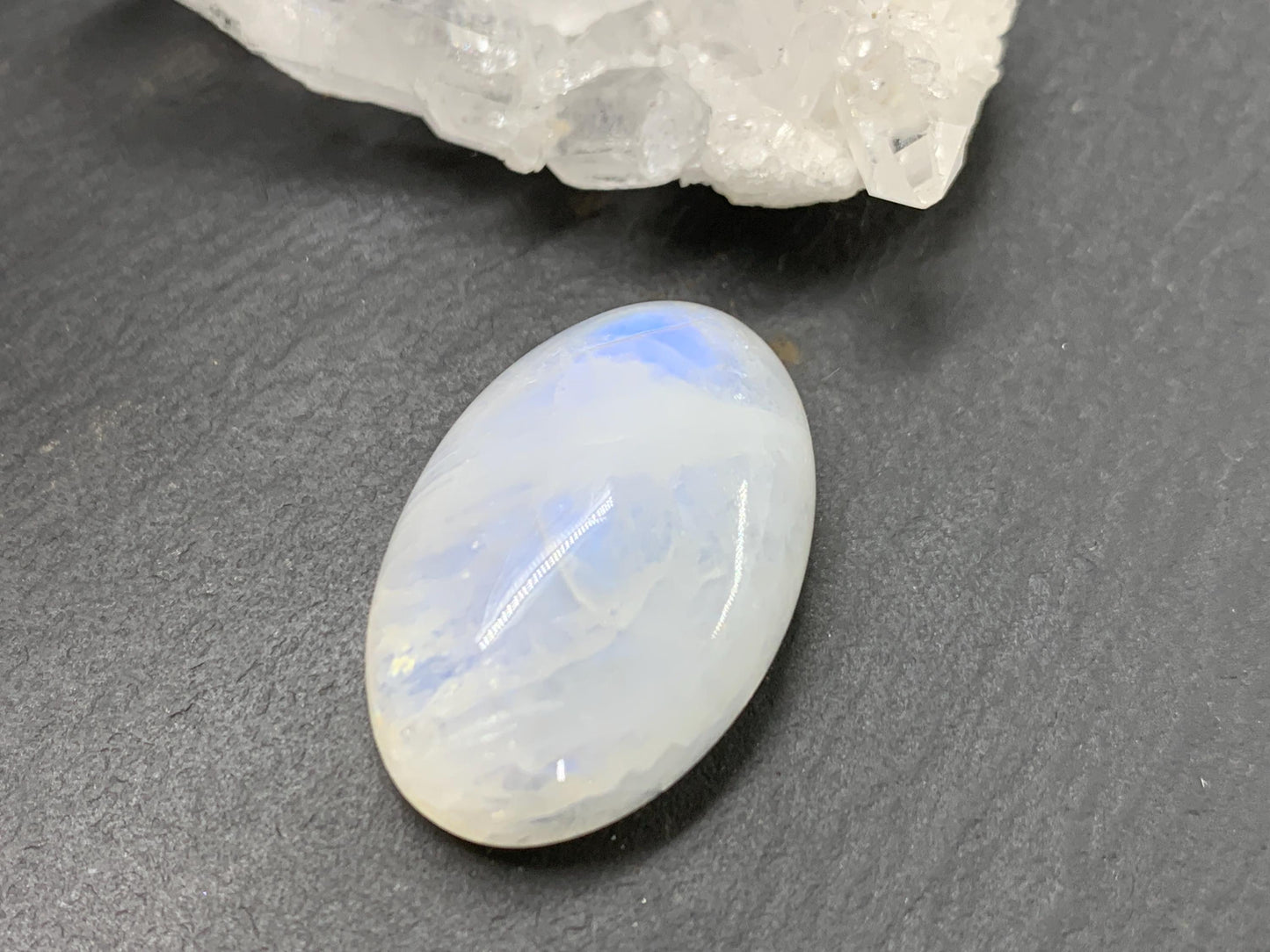 Rainbow Moonstone oval 24x16x9mm cabochon