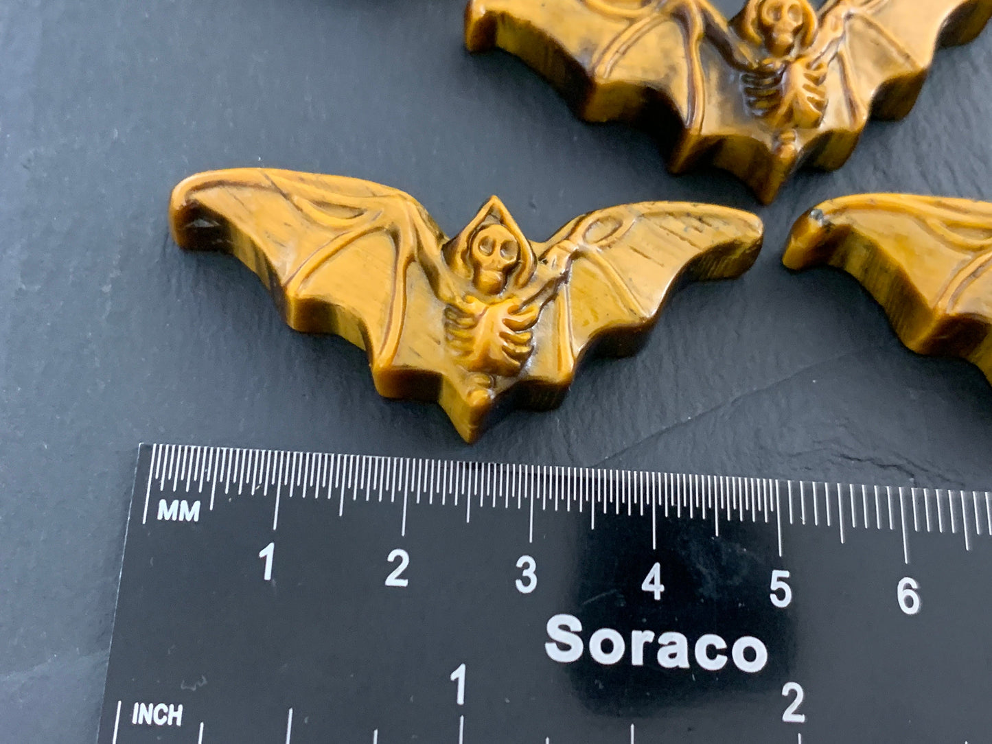 Tiger Eye skeleton bat cabochon carving