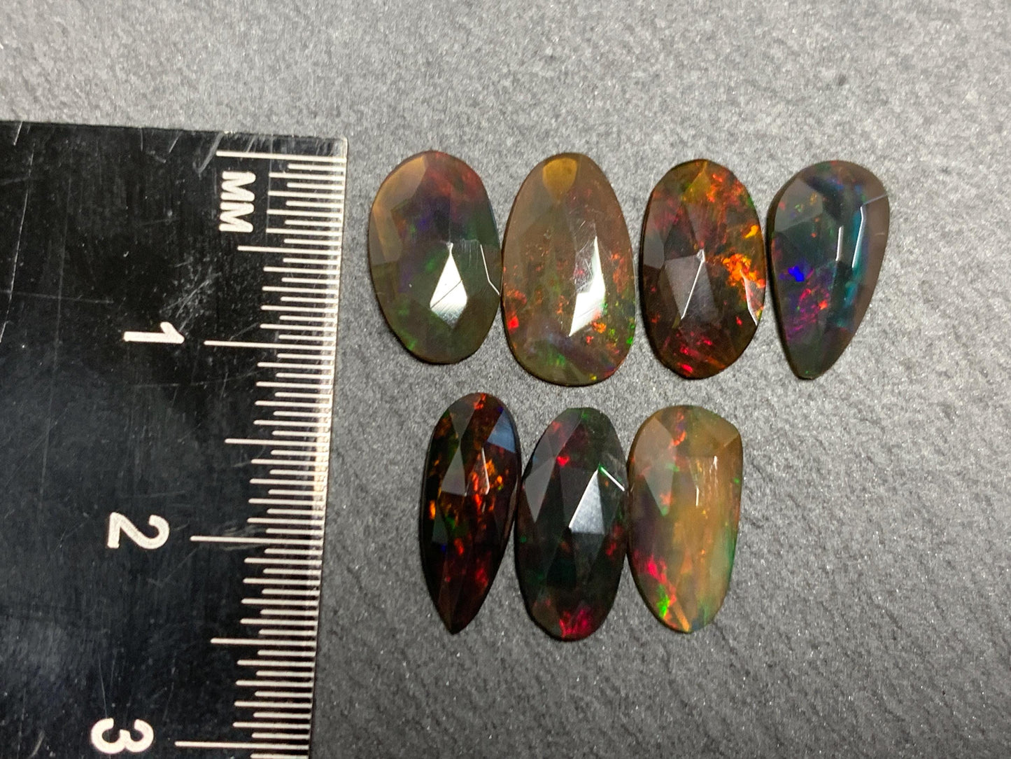 Faceted Black Ethiopian Opal 11-12mm long cabochon
