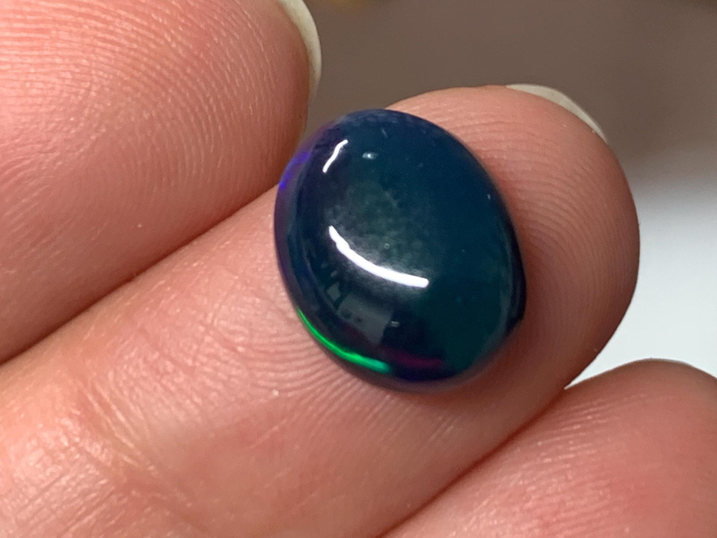 Natural Black Ethiopian Opal oval 9x11x4mm cabochon