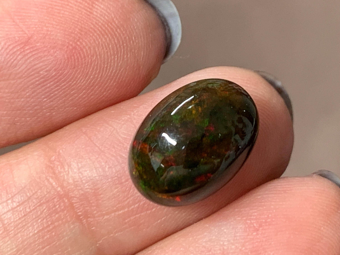 Natural Ethiopian Black Opal 10x14x6mm cabochon
