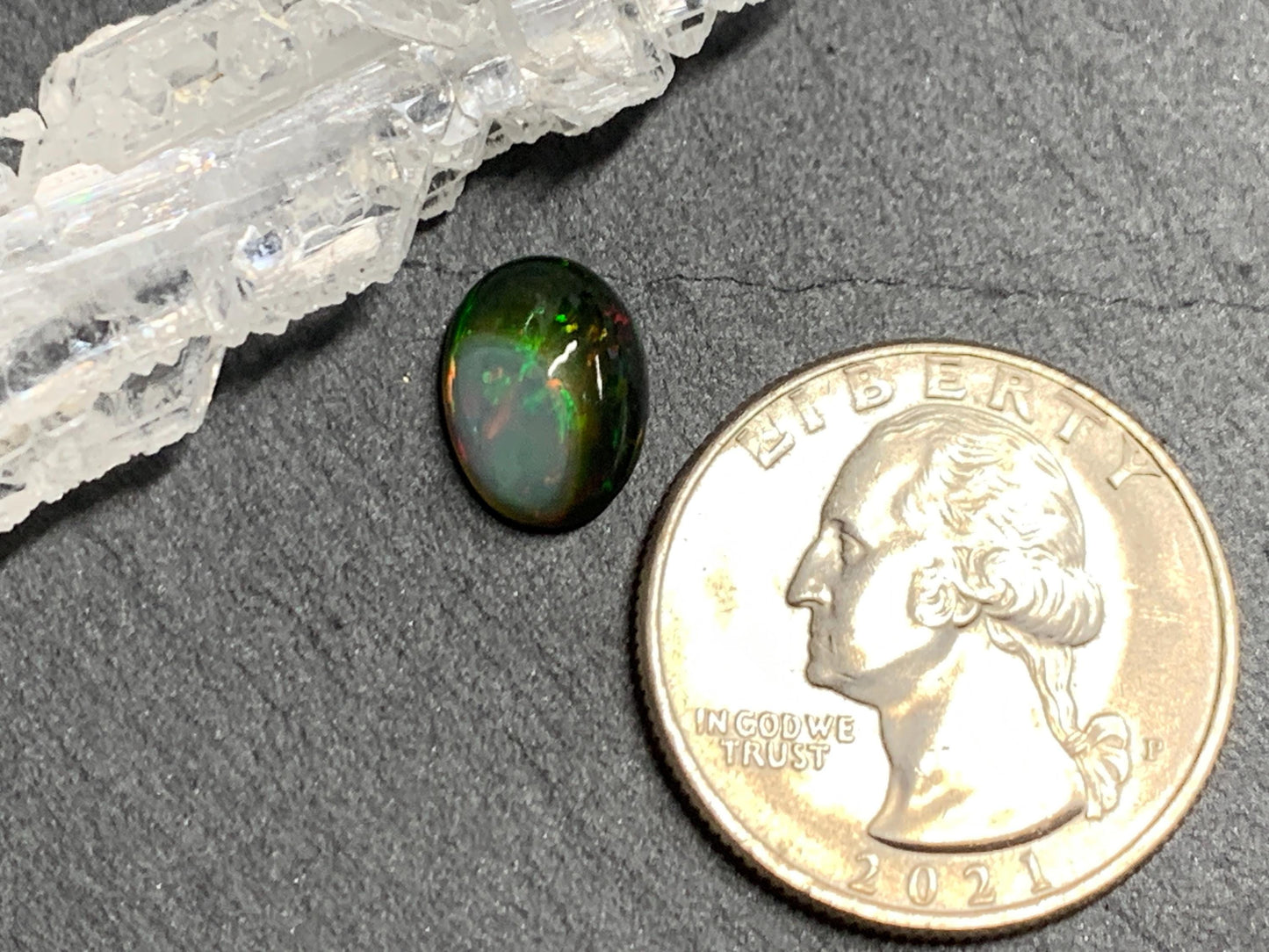 Natural Black Ethiopian Opal oval 8x11x4mm cabochon