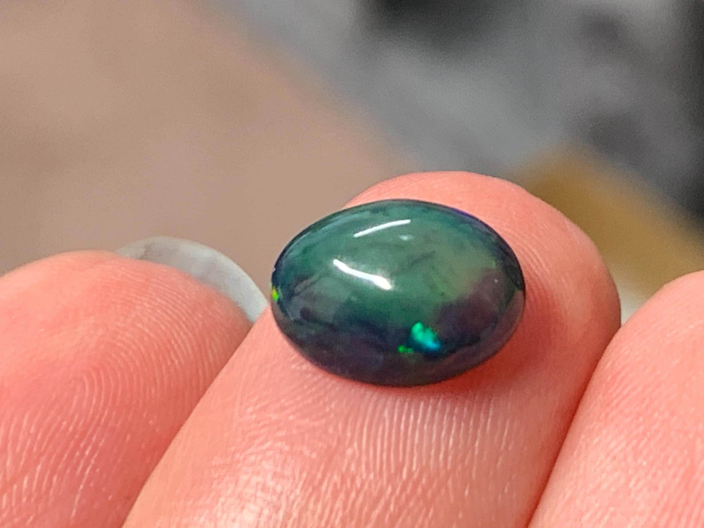 Natural Ethiopian Black Opal 8x10x4mm cabochon