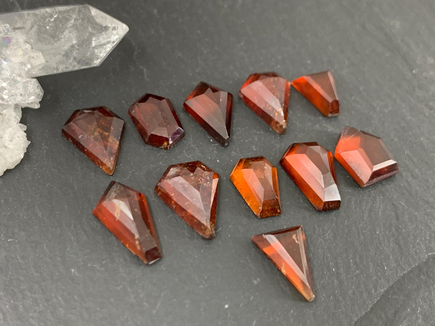 Faceted Hessonite Garnet 9-12mm long cabochon.