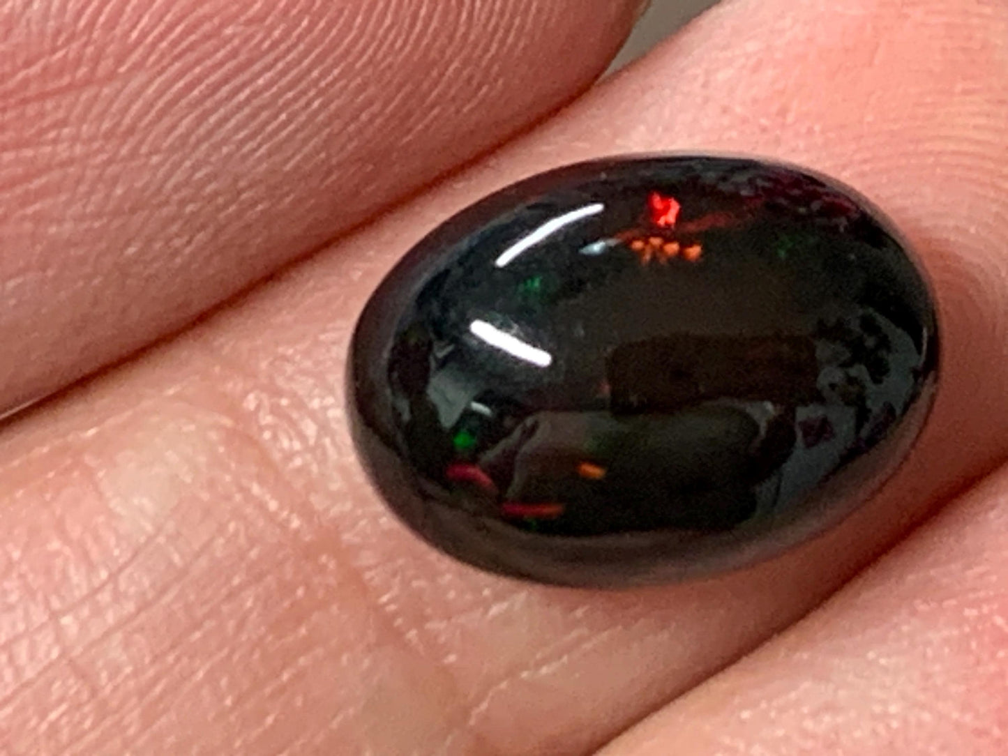 Natural Ethiopian Black Opal 10x14x6mm cabochon
