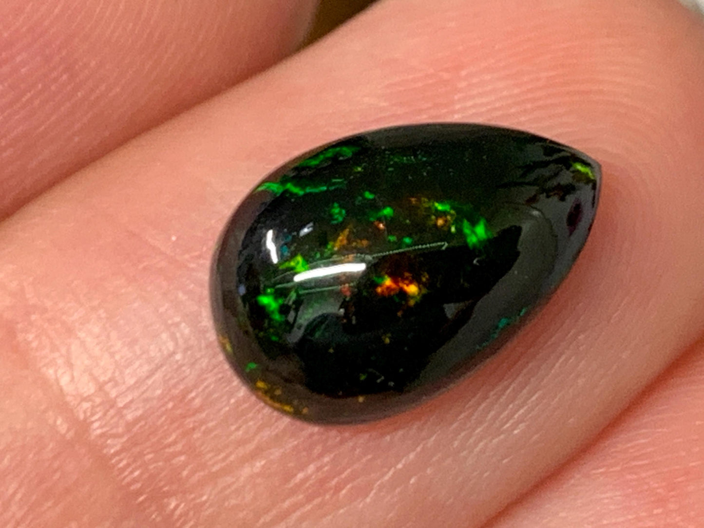 Natural Ethiopian Black Opal 8x12x4mm cabochon