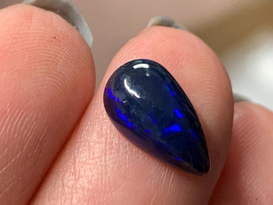 Natural Ethiopian Black Opal 7x12x4mm cabochon