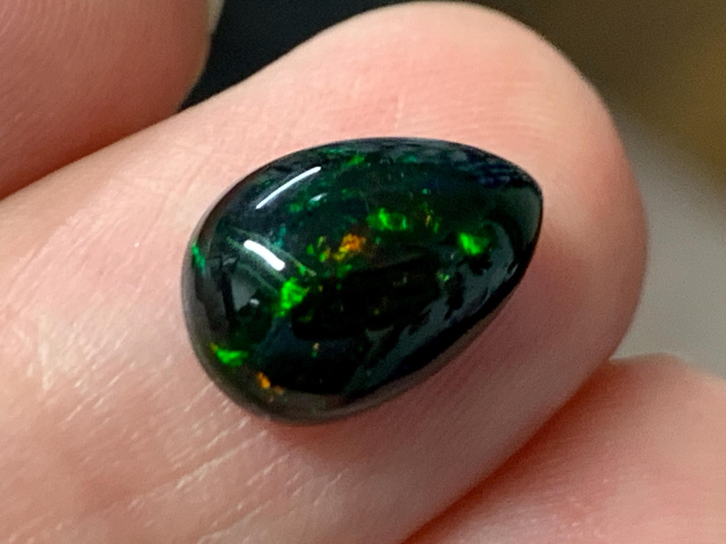 Natural Ethiopian Black Opal 8x12x4mm cabochon