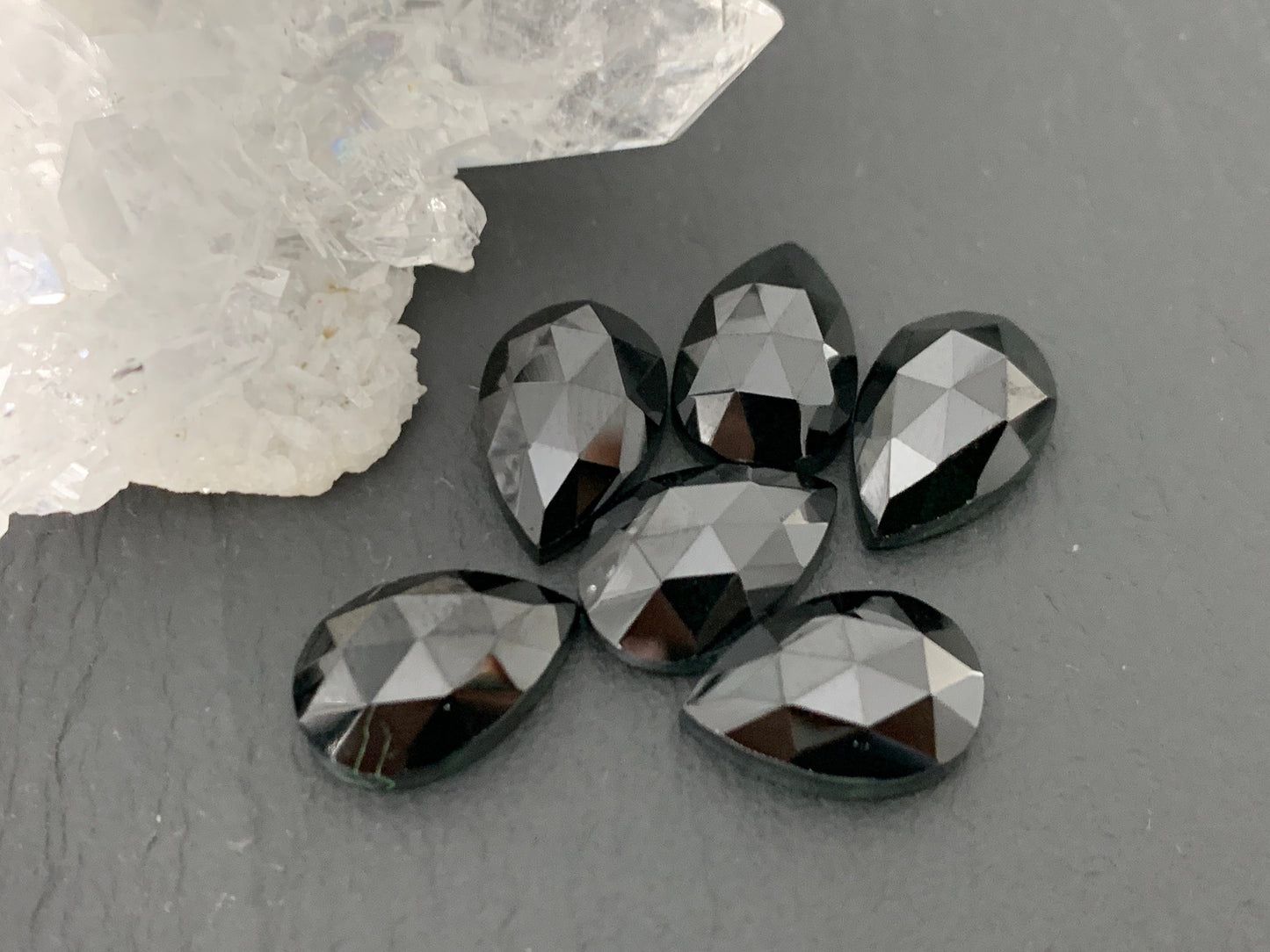 Faceted Black Spinel pear 8x12mm cabochon