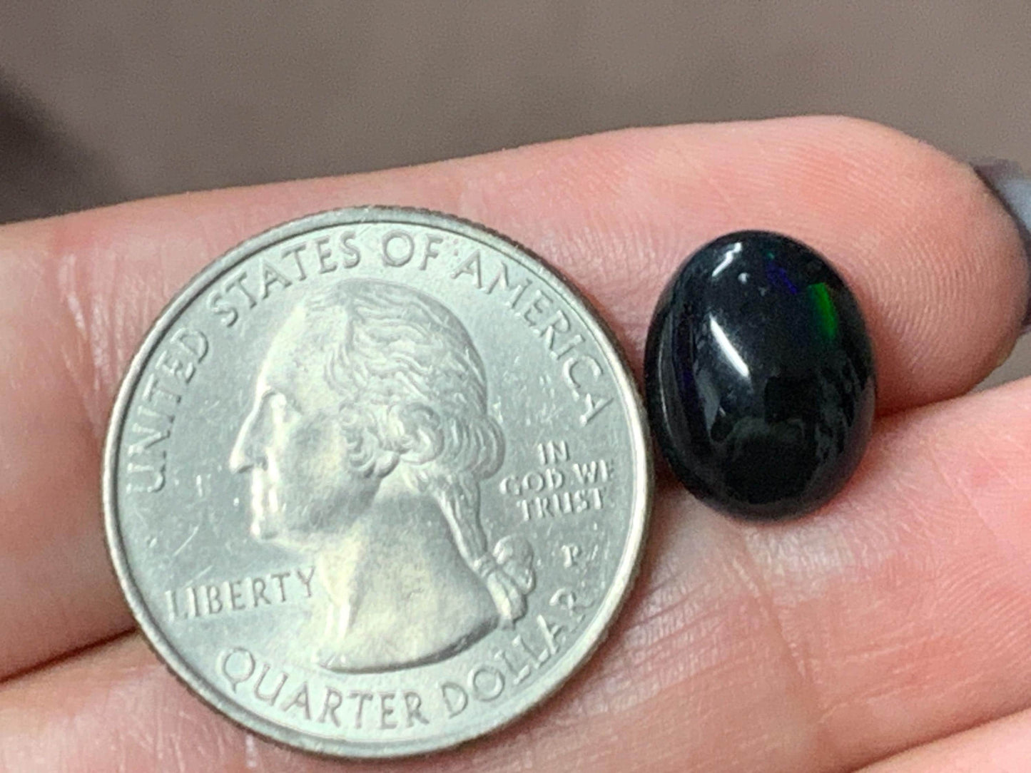 Natural Ethiopian Black Opal 10x12x5mm cabochon