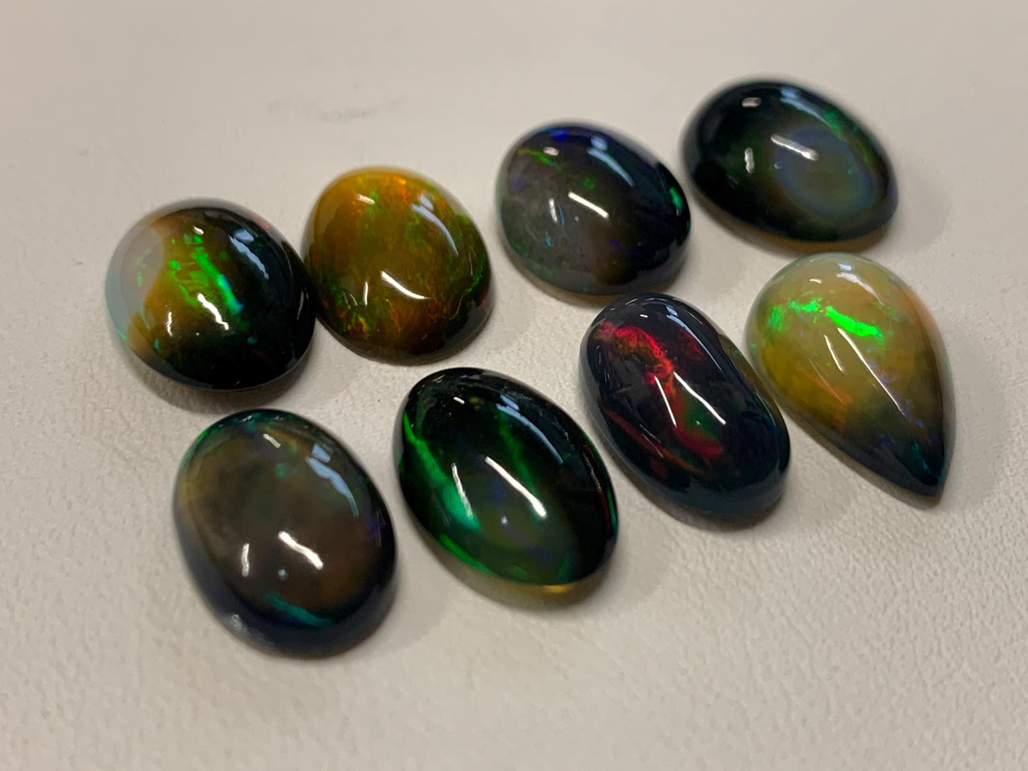 Natural Ethiopian Black Opal oval, pear 13-15mm long cabochon