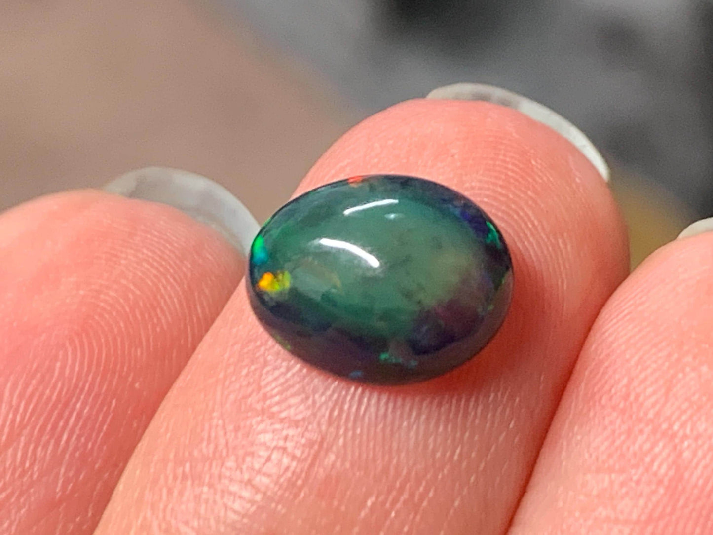 Natural Ethiopian Black Opal 8x10x4mm cabochon