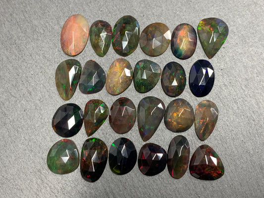 Faceted Black Ethiopian Opal 12-16mm long cabochon