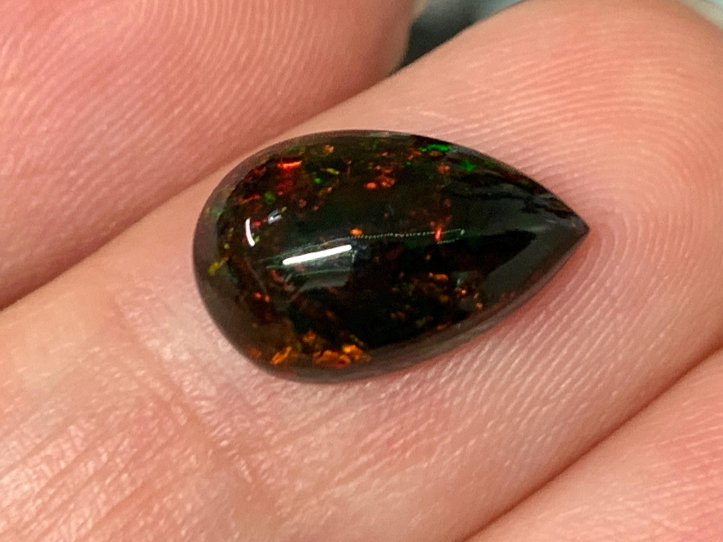 Natural Ethiopian Black Opal 8x12x4mm cabochon