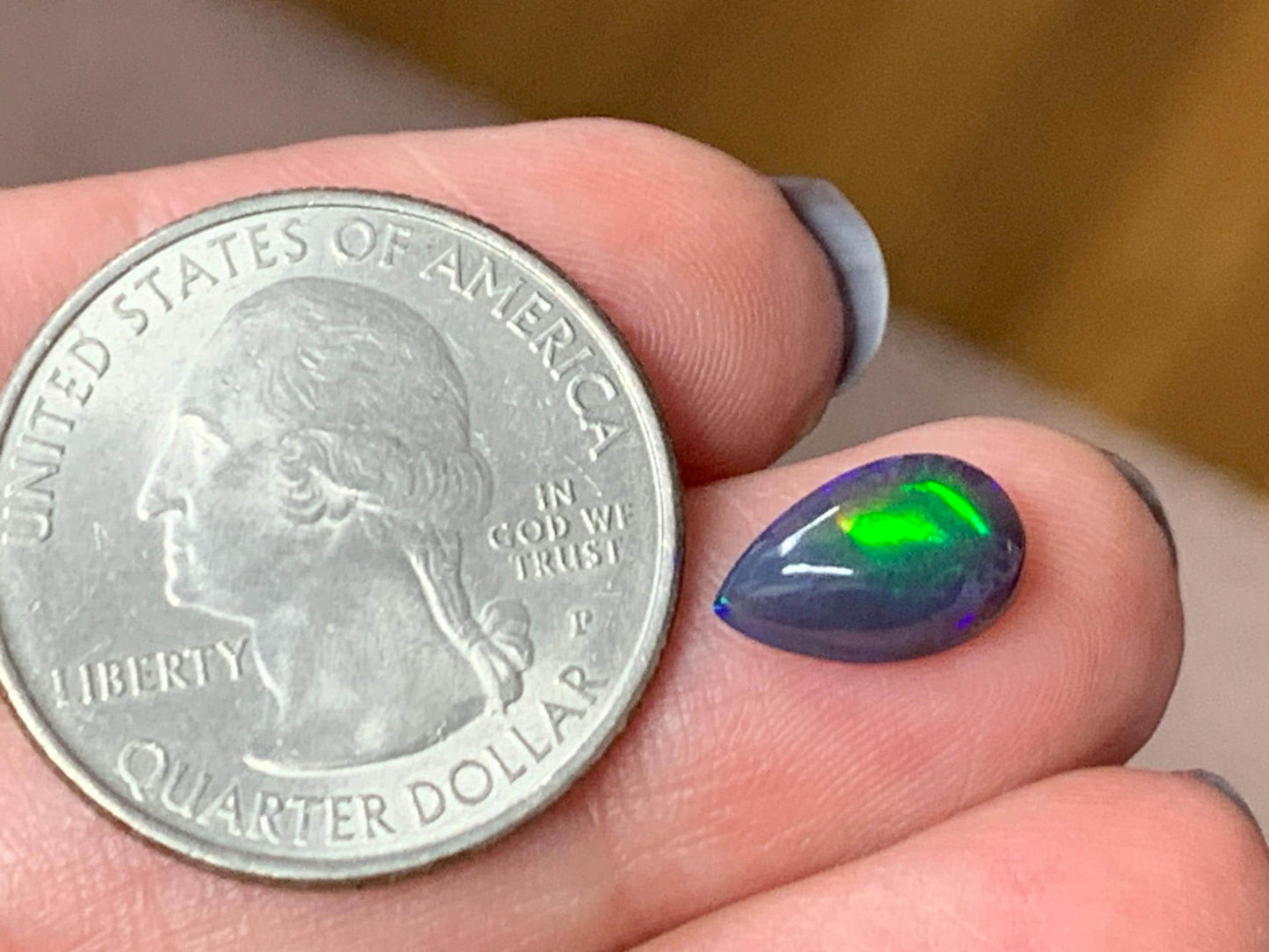 Natural Ethiopian Black Opal 7x11x4mm cabochon