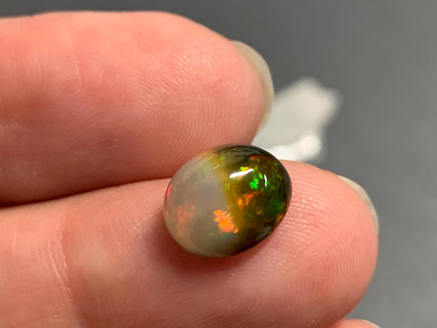 Natural Black Ethiopian Opal oval 8x10x6mm cabochon