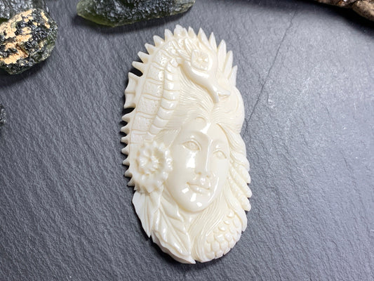 Bull Bone Carving - Woman with sea horse