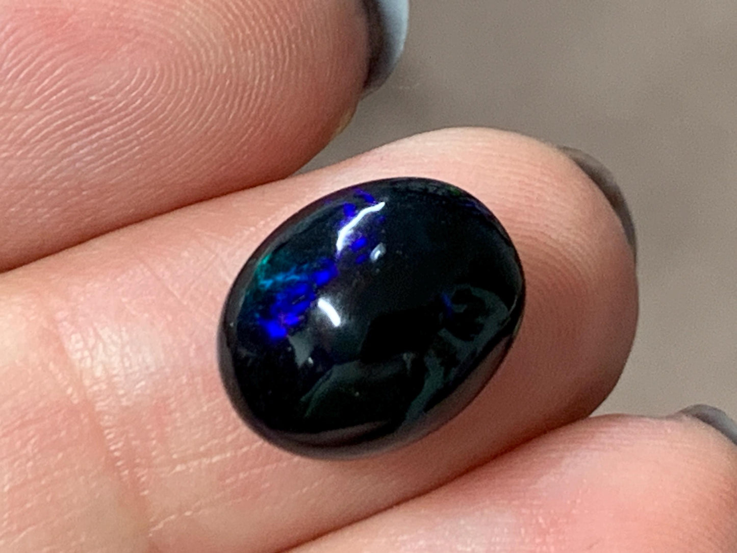 Natural Ethiopian Black Opal 10x12x5mm cabochon