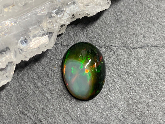 Natural Black Ethiopian Opal oval 8x11x4mm cabochon