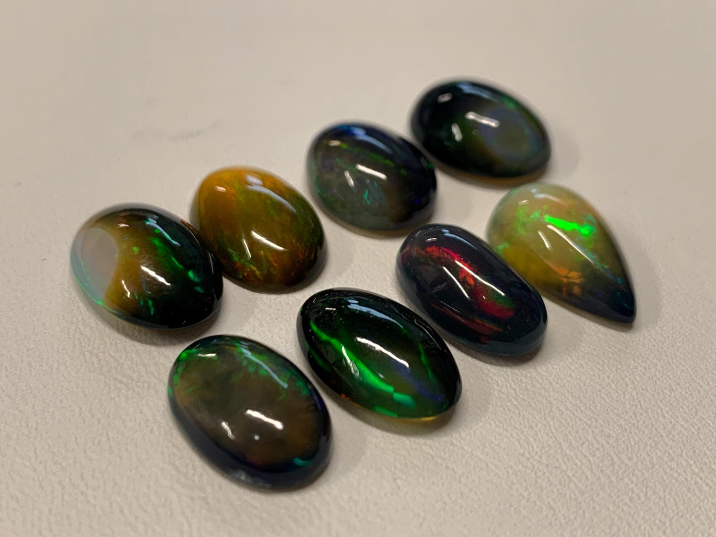 Natural Ethiopian Black Opal oval, pear 13-15mm long cabochon