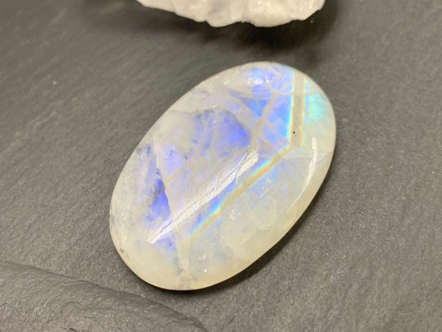 Rainbow Moonstone oval 38x25x7mm cabochon