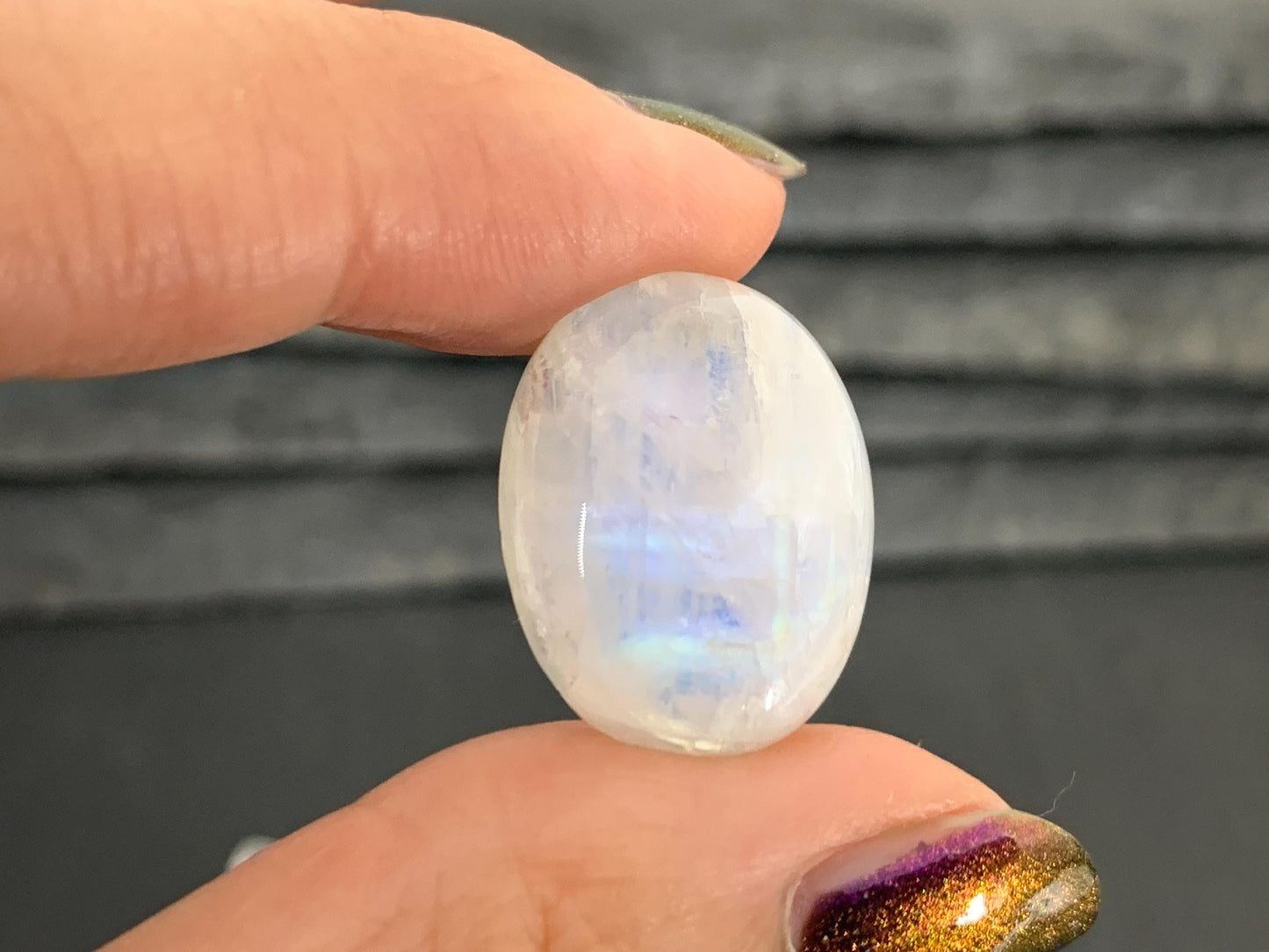 Rainbow Moonstone oval 21x16x9mm cabochon