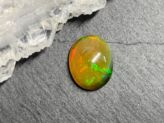 Natural Black Ethiopian Opal oval 9x11x4mm cabochon