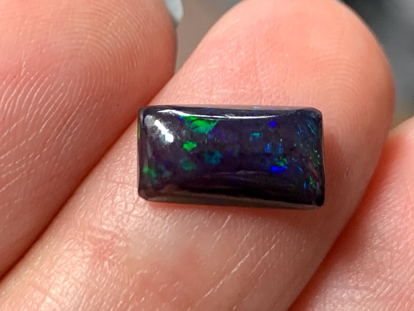 Natural Ethiopian Black Opal 6x11x3mm cabochon