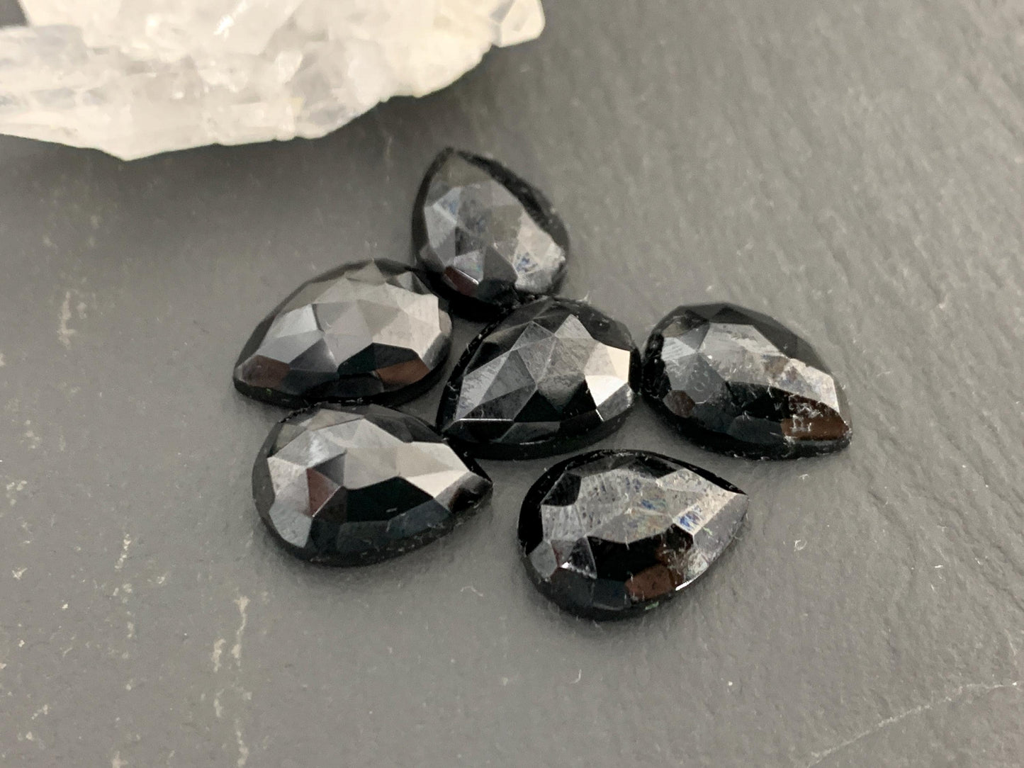 Faceted Black Spinel pear 10x14mm cabochon
