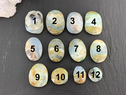 Faceted Peruvian Opal 8-14mm long cabochon.