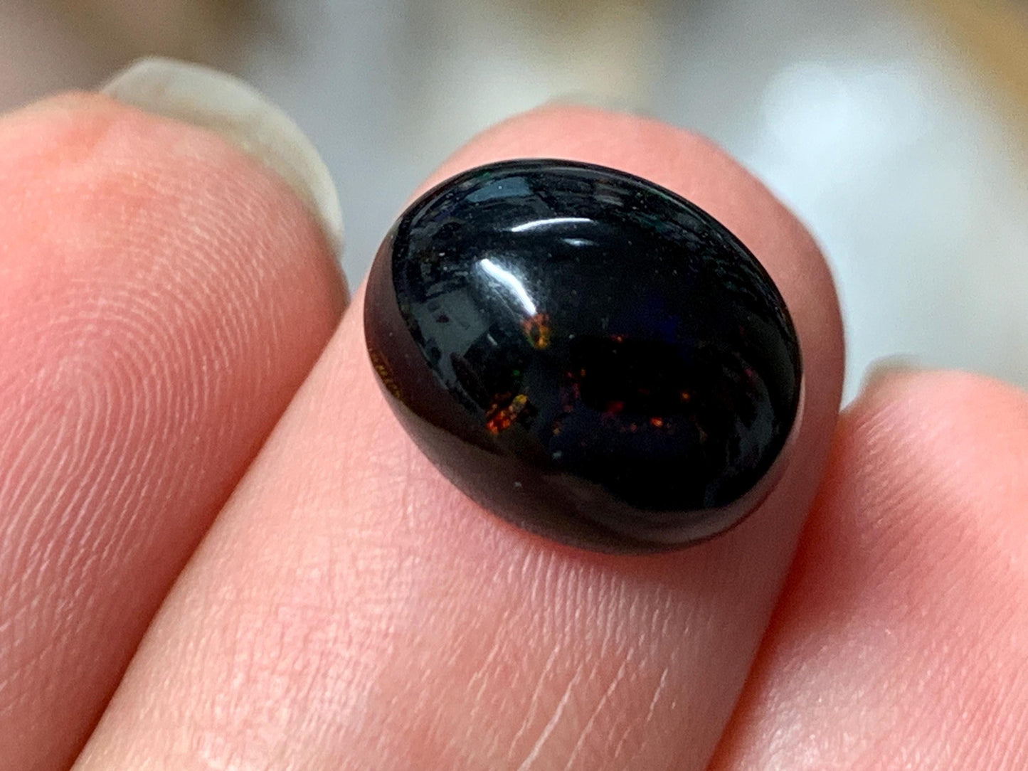 Natural Ethiopian Black Opal 9x12x7mm cabochon