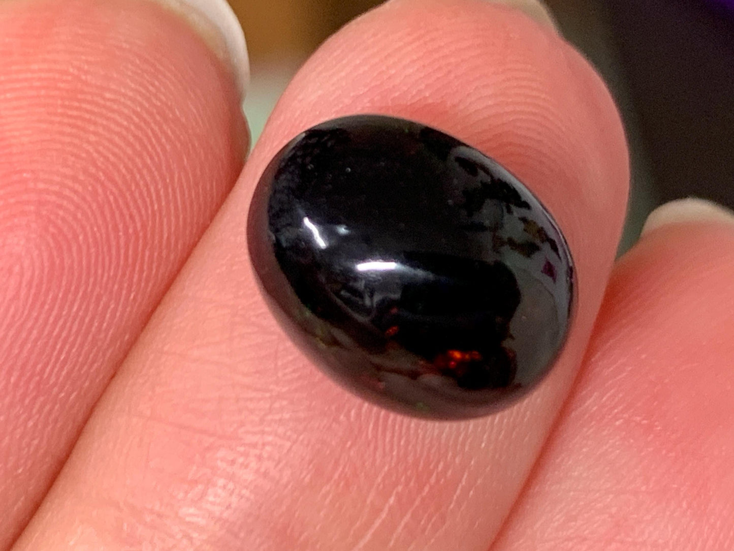Natural Ethiopian Black Opal 9x12x7mm cabochon