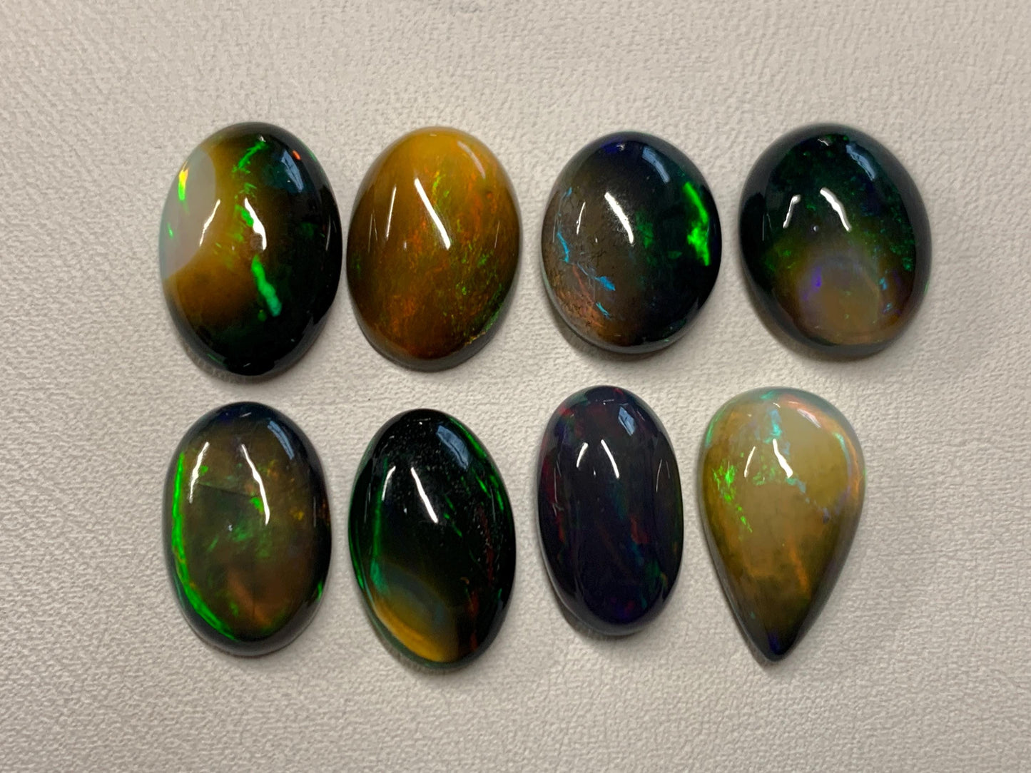 Natural Ethiopian Black Opal oval, pear 13-15mm long cabochon