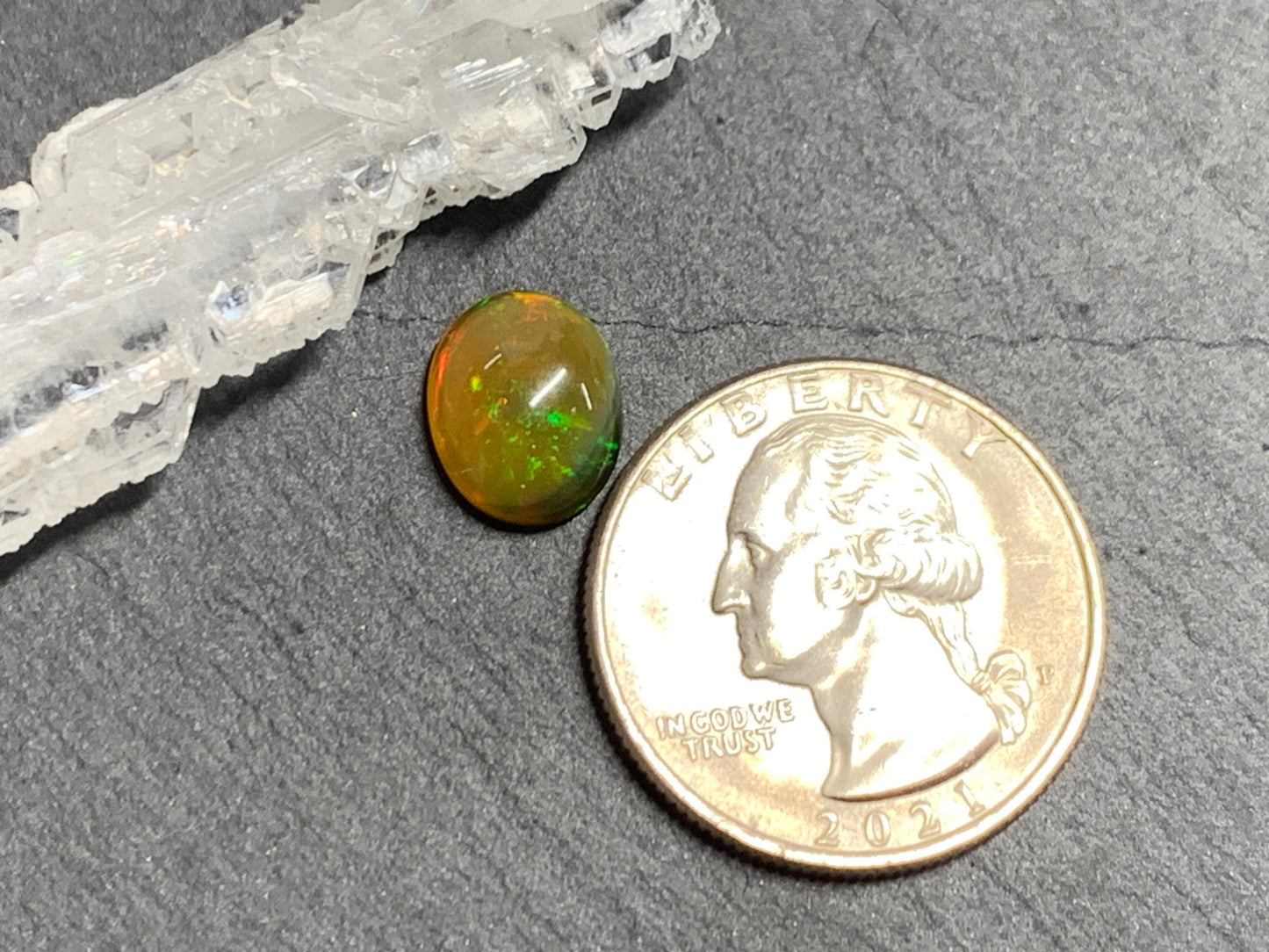 Natural Black Ethiopian Opal oval 9x11x4mm cabochon
