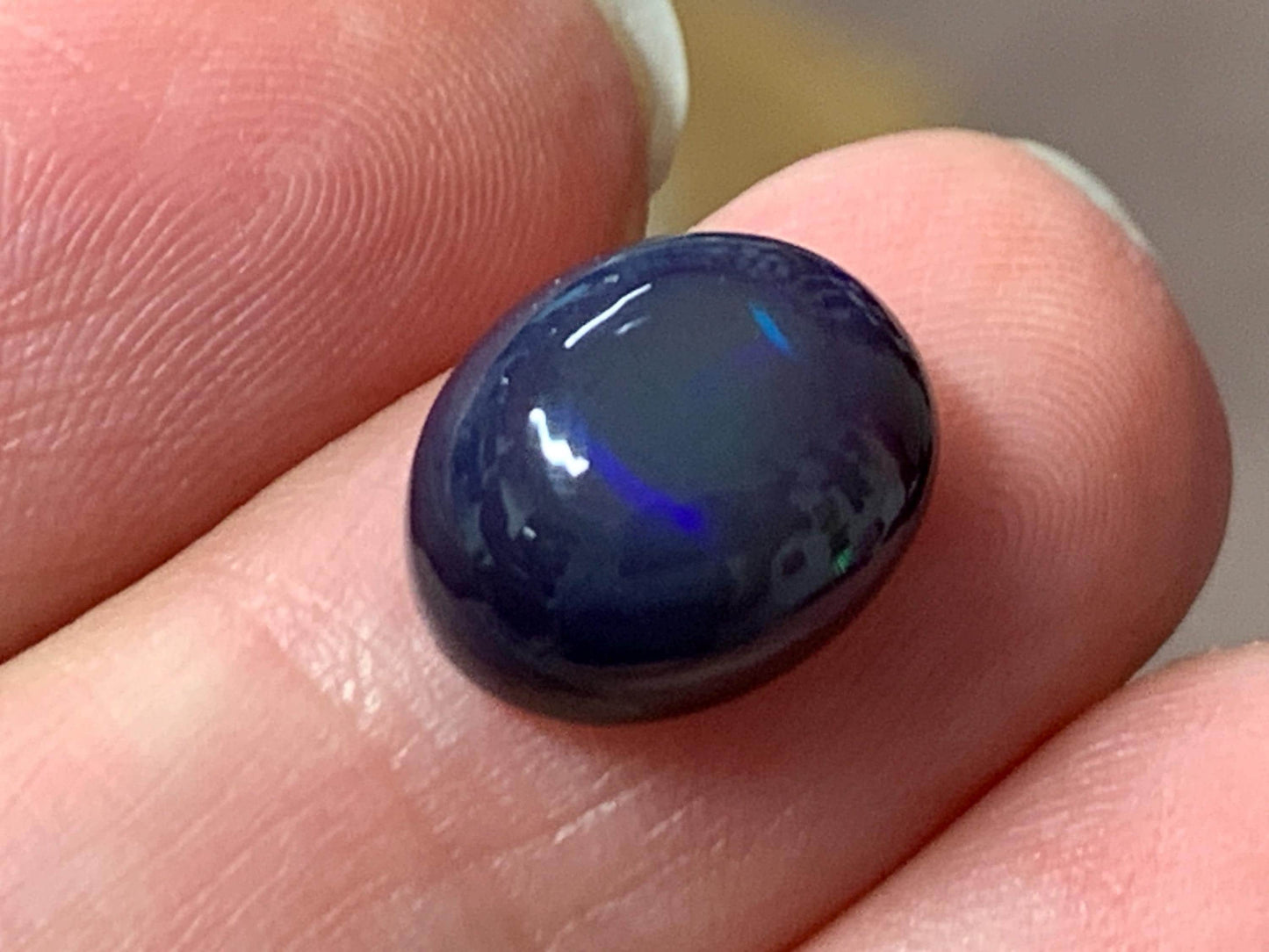 Natural Ethiopian Black Opal 9x12x6mm cabochon