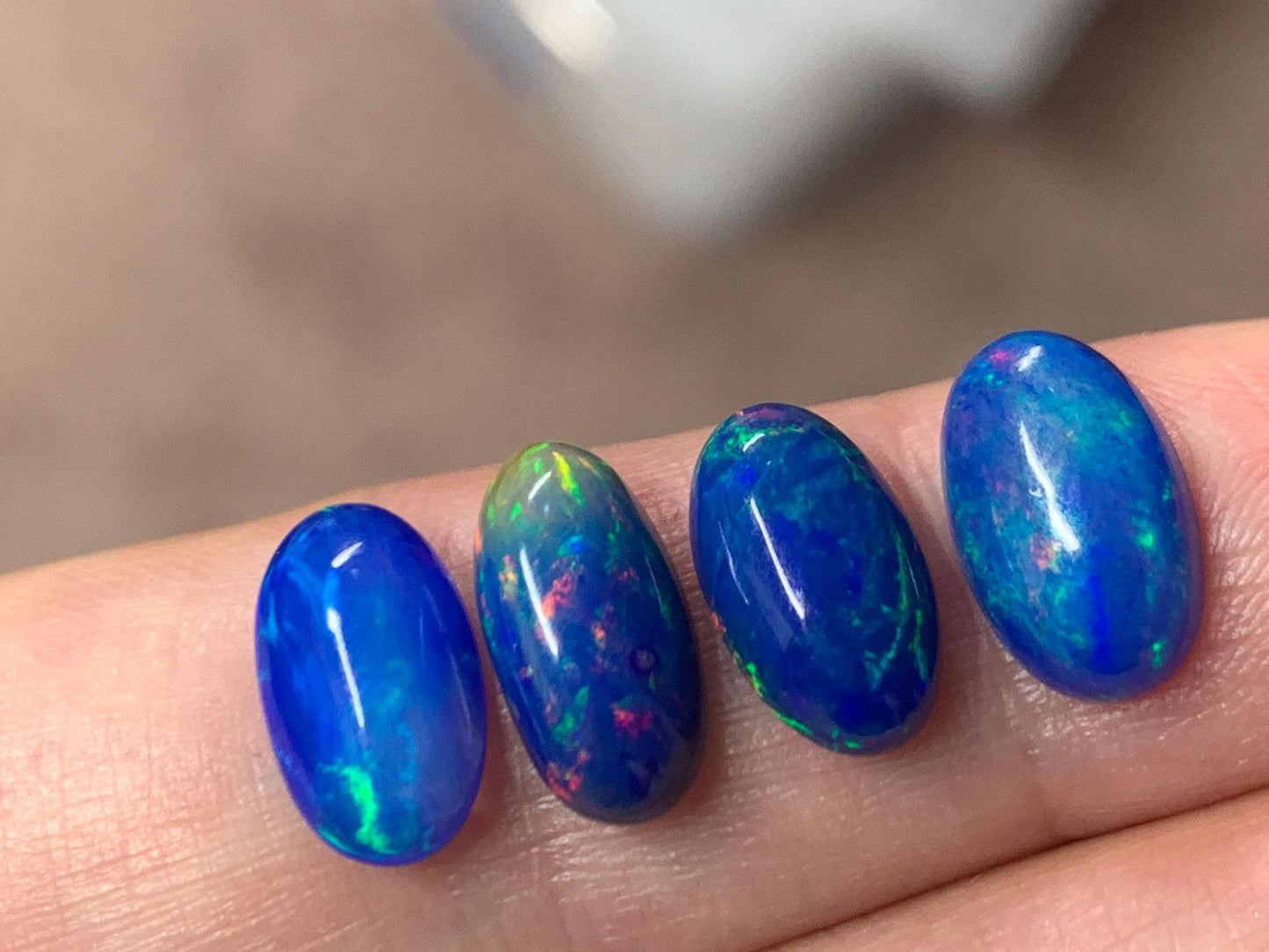 Ethiopian Opal oval 11-12mm long cabochon - Natural Opal smoked to blue color