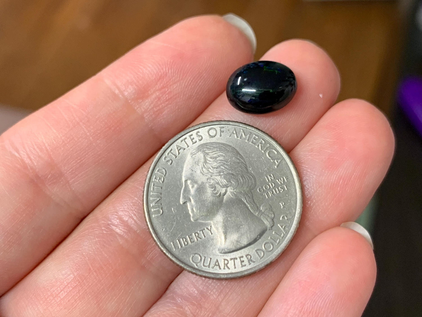 Natural Ethiopian Black Opal 9x11x4mm cabochon