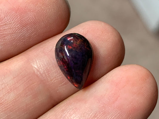 Black Ethiopian Opal pear 8x13x4mm cabochon
