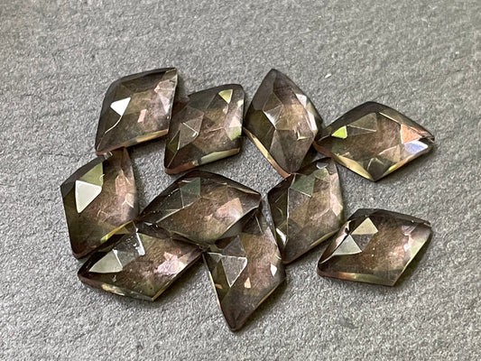 Faceted color changing Alexandrite rhombus 8x12mm cabochon