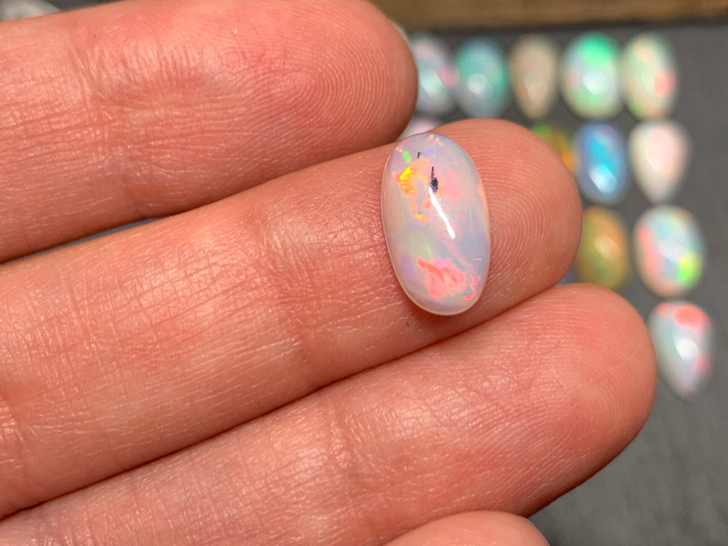 Ethiopian Opal pear, oval 11-12mm long cabochon