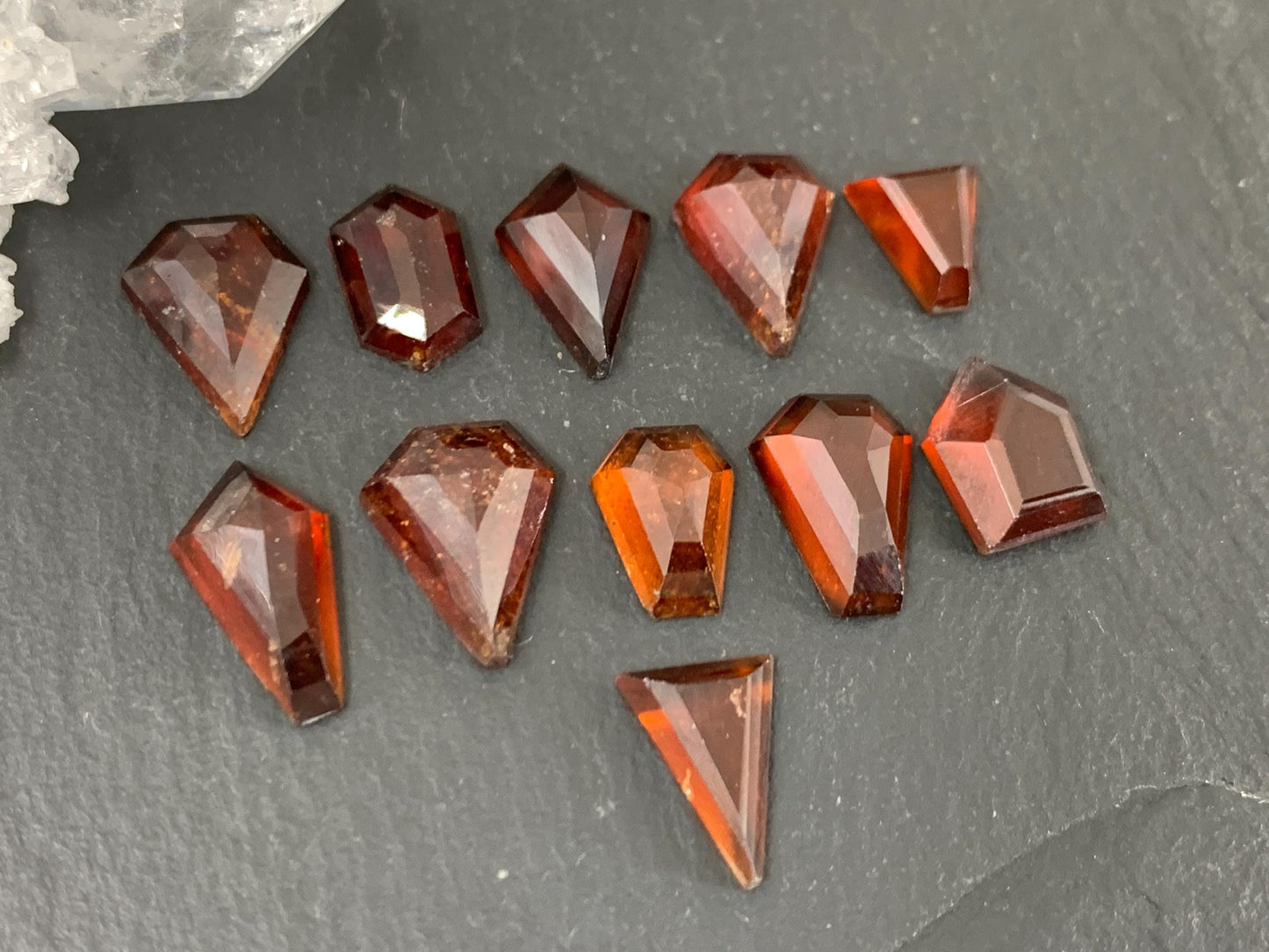 Faceted Hessonite Garnet 9-12mm long cabochon.