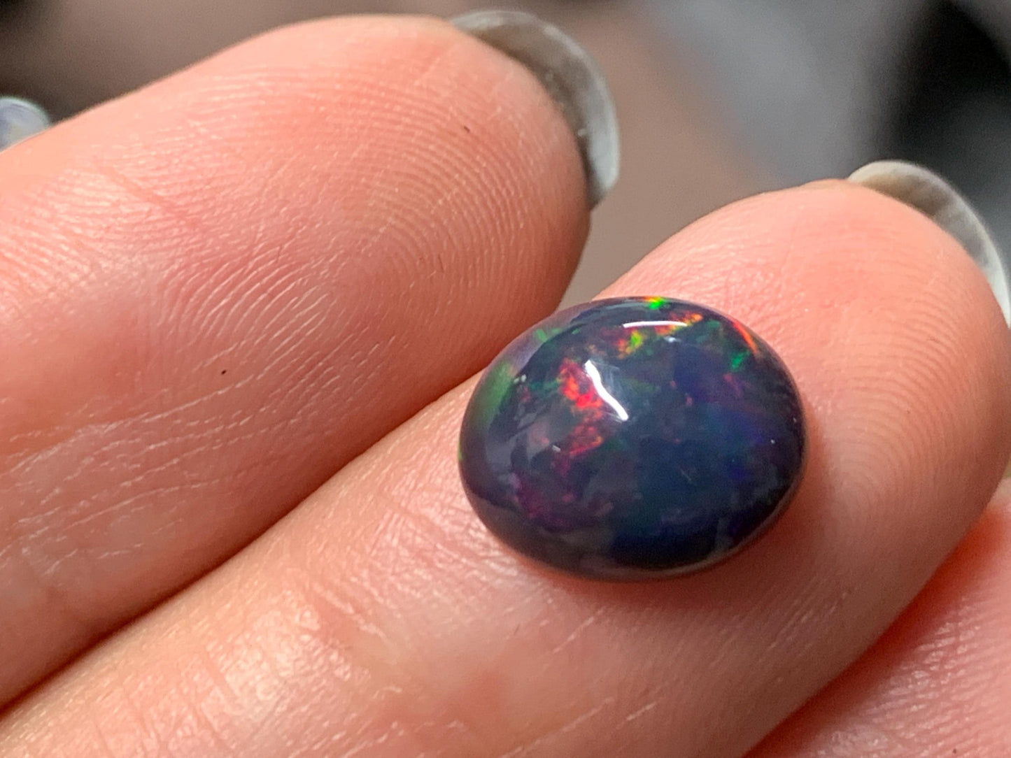 Natural Ethiopian Black Opal 8x11x4mm cabochon