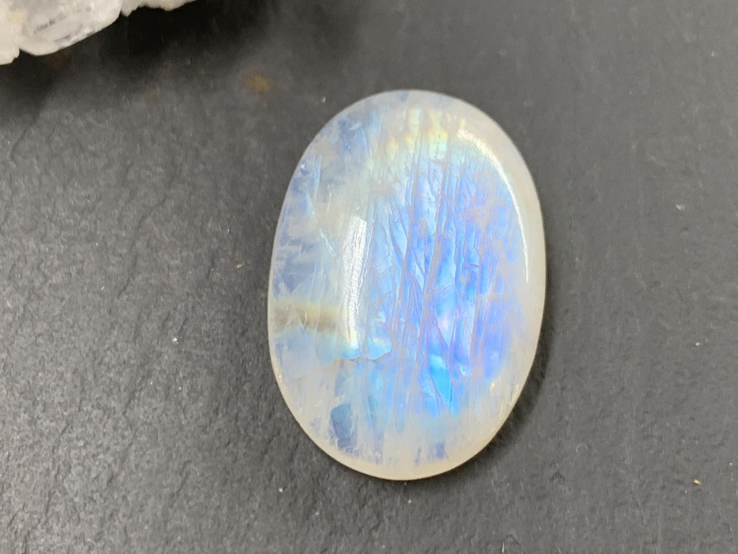 Rainbow Moonstone oval 22x15x6mm cabochon