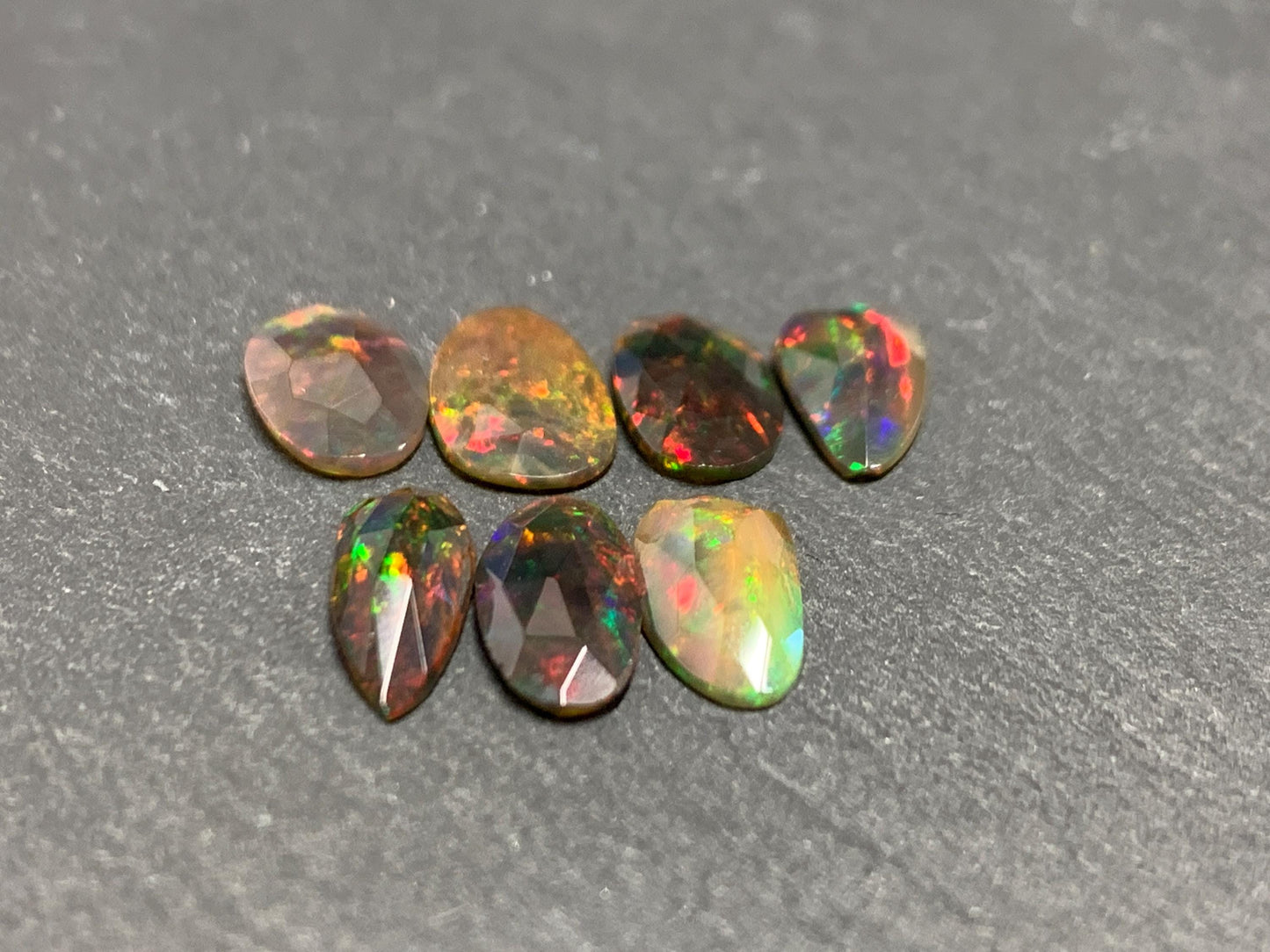 Faceted Black Ethiopian Opal 11-12mm long cabochon