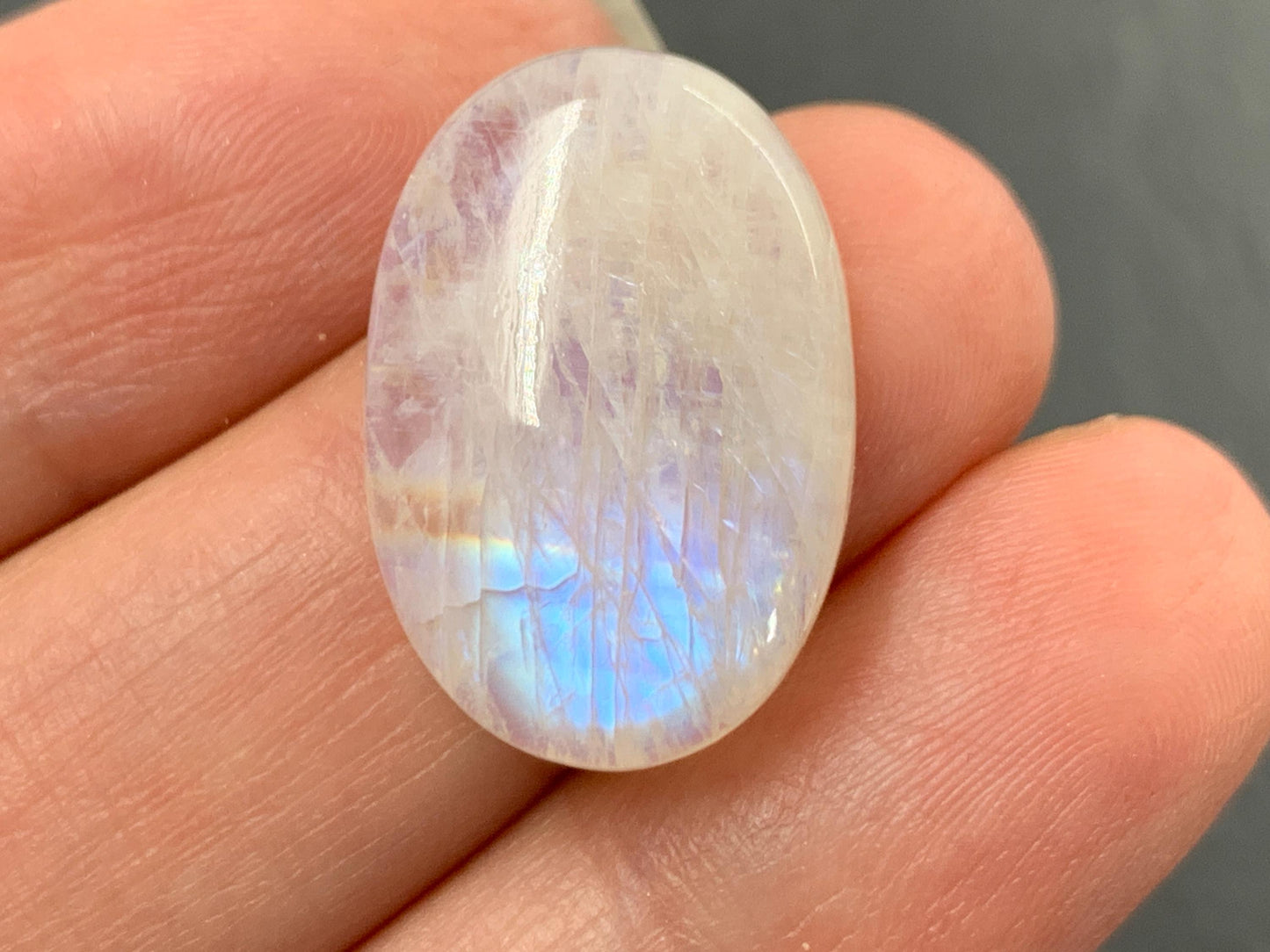 Rainbow Moonstone oval 22x15x6mm cabochon