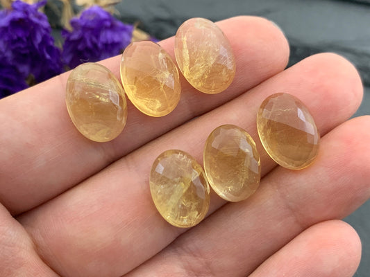 Faceted Citrine oval 10x14mm cabochon