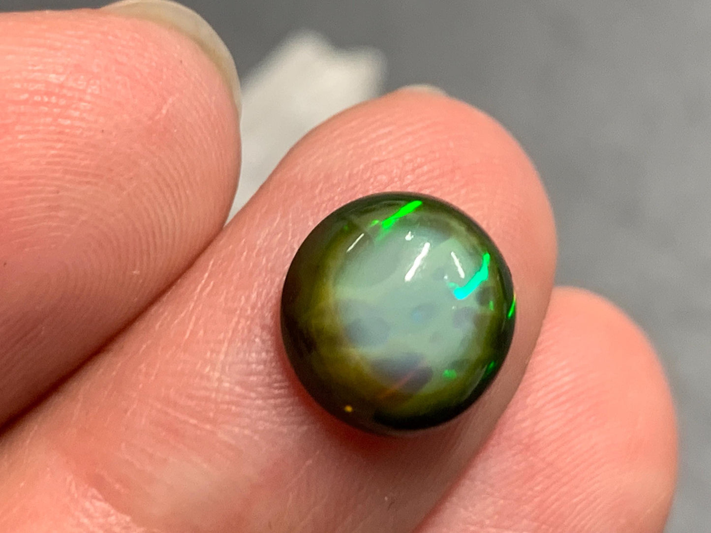 Natural Black Ethiopian Opal round 9.5x9.5x4mm cabochon