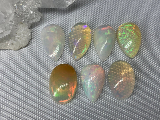 Ethiopian Opal pear 13mm long cabochon