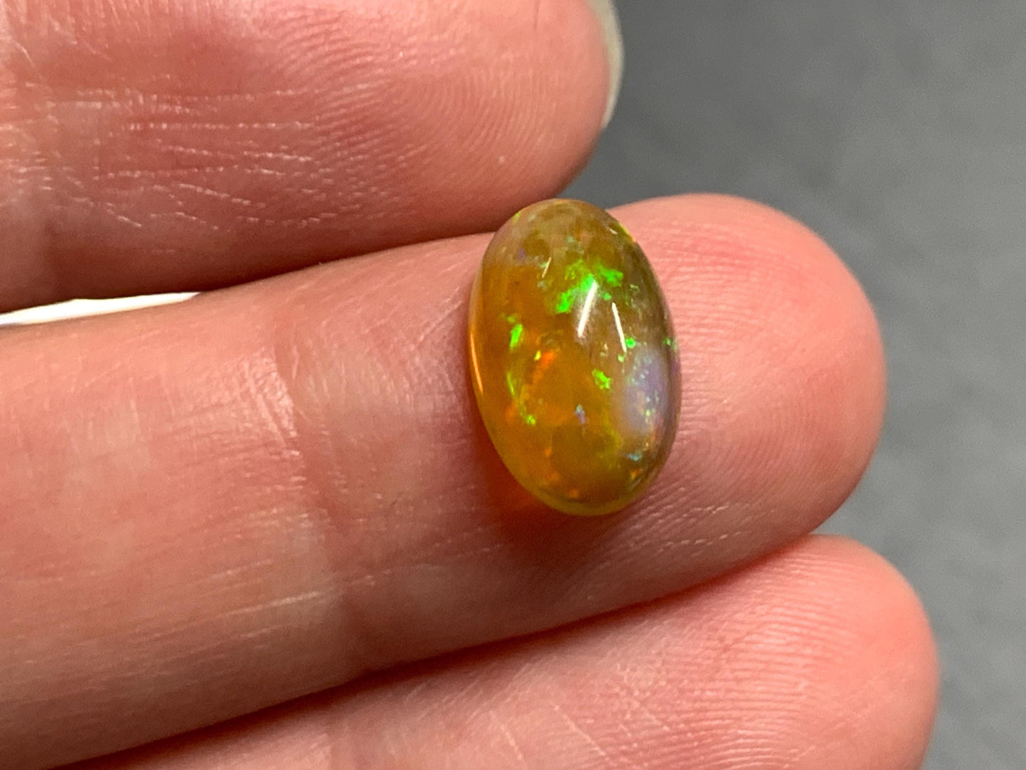 Natural Black Ethiopian Opal pear 7x12x4mm cabochon