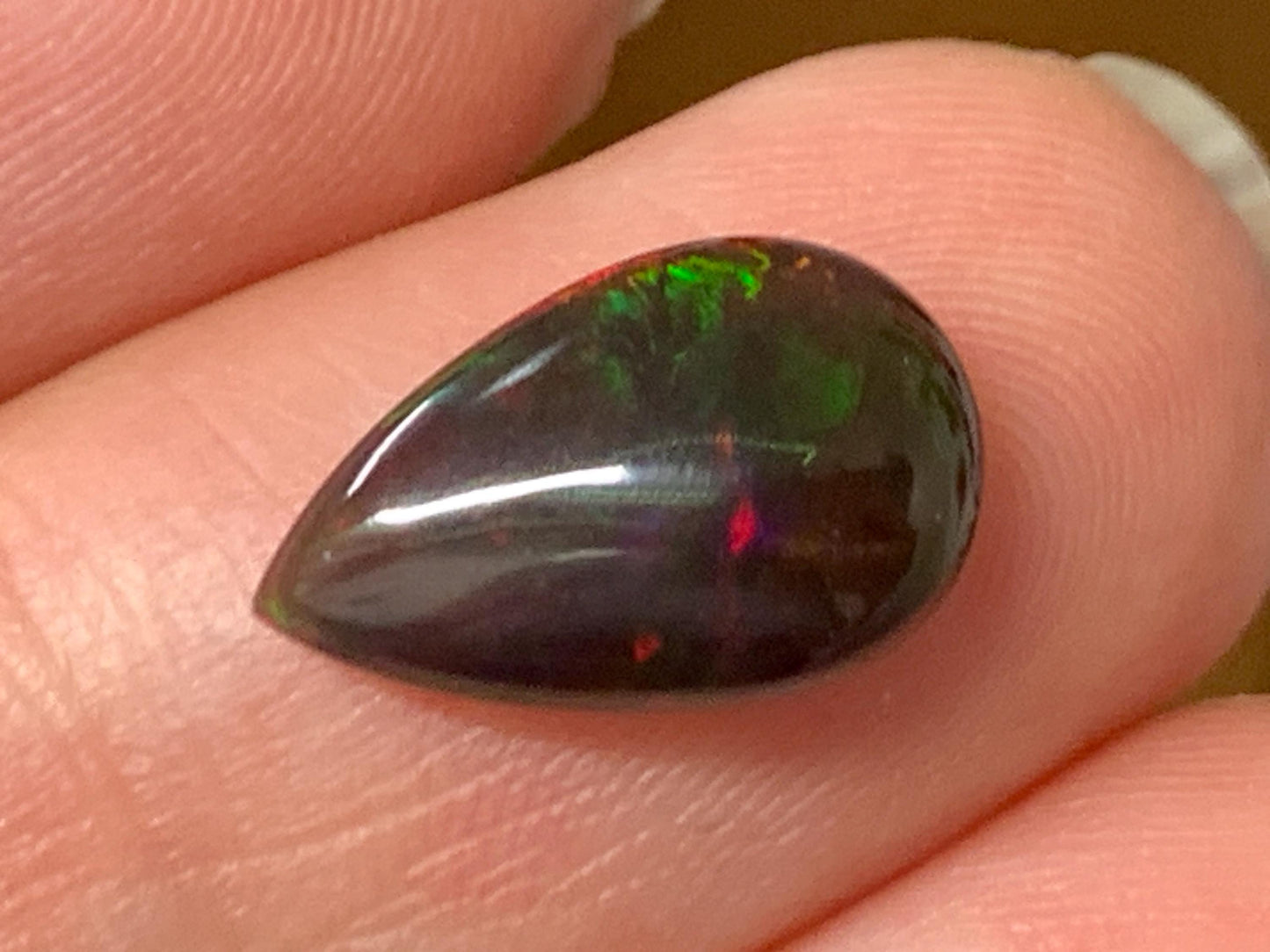 Natural Ethiopian Black Opal 8x13x4mm cabochon